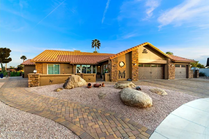 3-Car full length garage! PLUS a side 2-Golf Cart Garage!