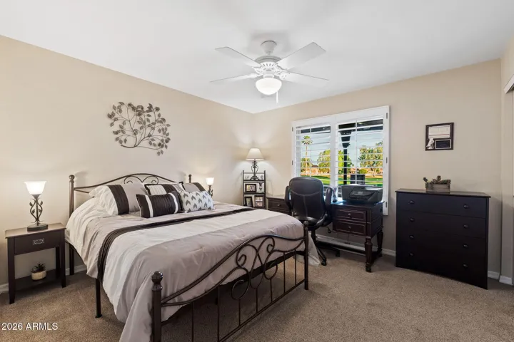 The rear guest bedroom with beautiful views to the golf course.