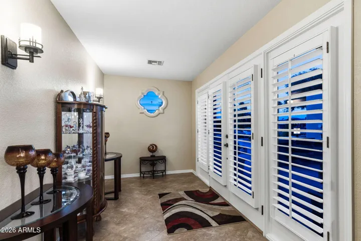 Double Door Entry into the spacious foyer.