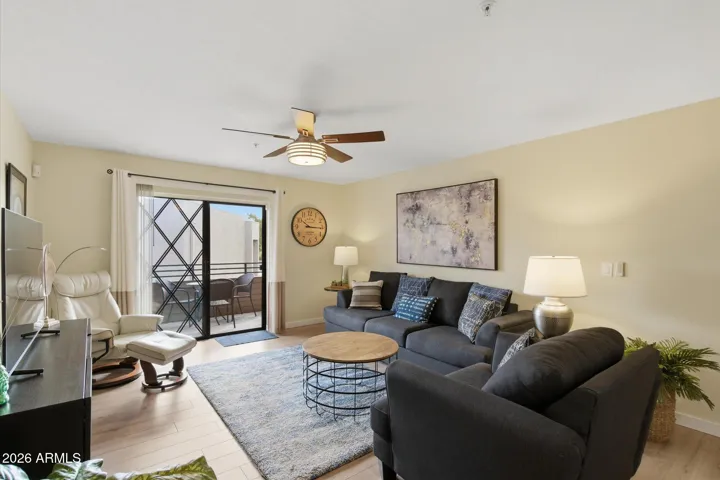Natural light from the patio fills the living room