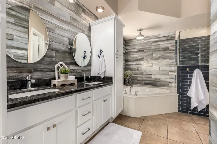 Remodeled cabinets, sinks & shower