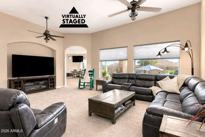 This AI- generated image shows if the carpeting was updated to a more neutral color.