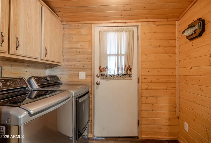 Laundry Room with great storage and washer and dryer is included