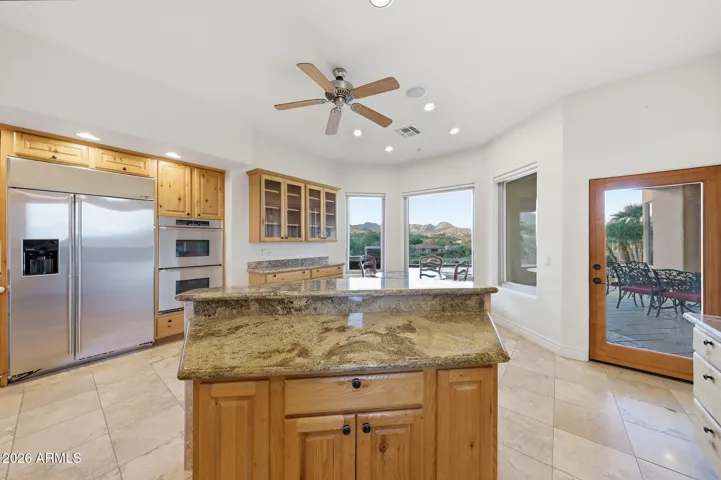 Large, bright, chef's kitchen with views in every direction