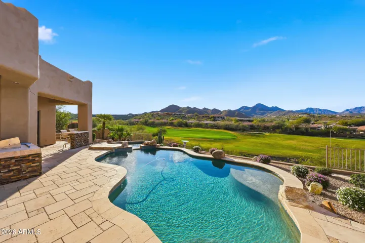 Resort style living with incredible golf course & mountain views!