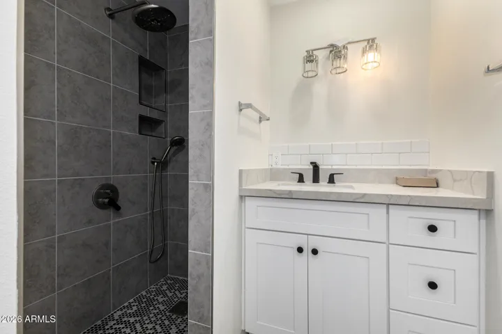 Luxurious updated bathroom w/walk in shower