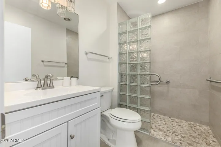 Luxurious updated bathroom w/walk in shower