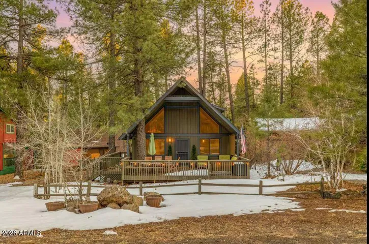 Front Exterior- NEW exterior paint, large partially covered deck, plenty of parking, fully fenced yard with gate access on the left side.