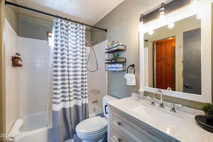 Full Bathroom on the main level with shower/tub, NEW flooring, and NEW paint.