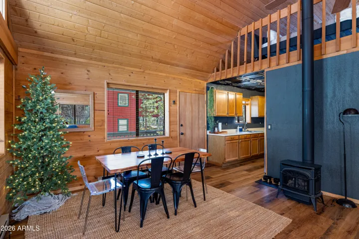 Dining area right off the kitchen- NEW interior paint, NEW flooring, and NEW light fixtures.