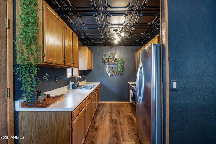 Dining area right off the kitchen- NEW interior paint, NEW flooring, and NEW light fixtures.
