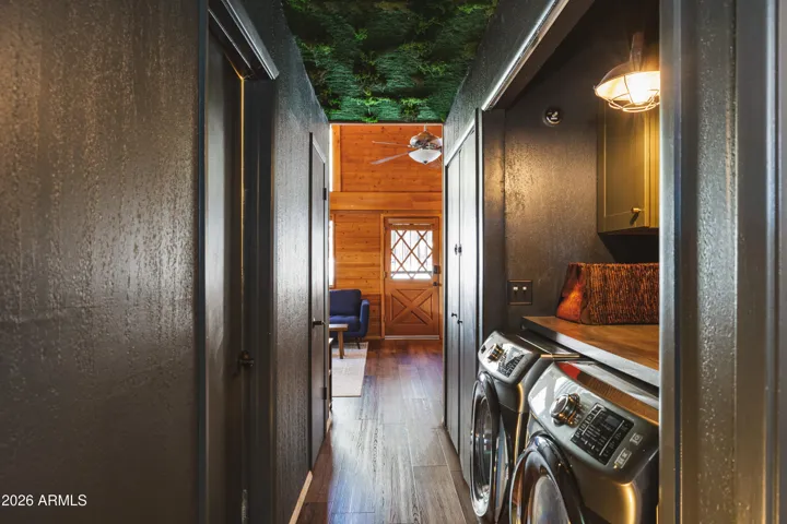 New washer and dryer plus hall way access and additional storage closet.