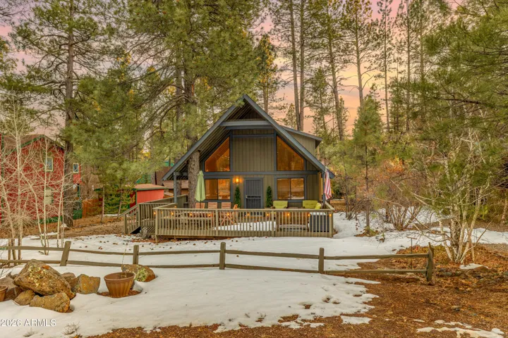 Front Exterior- NEW exterior paint, large partially covered deck, plenty of parking, fully fenced yard with gate access on the left side.