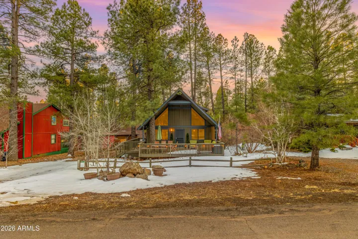Front Exterior- NEW exterior paint, large partially covered deck, plenty of parking, fully fenced yard with gate access on the left side.