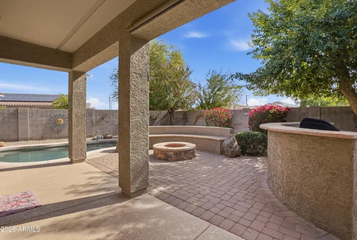Upgraded backyard with your own firepit and swimming pool!