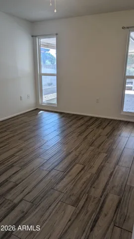 Primary bedroom with newer tile.
