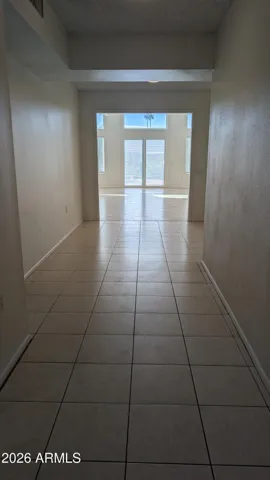 Walking into the house you can see through to back doors.