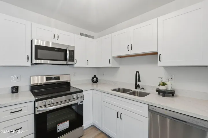 See photos 28-32 for other Kitchen set up ideas!