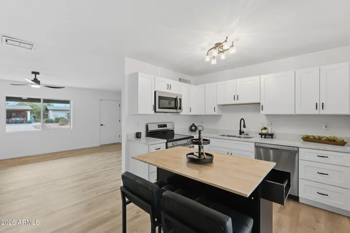 See photos 28-32 for other Kitchen set up ideas!