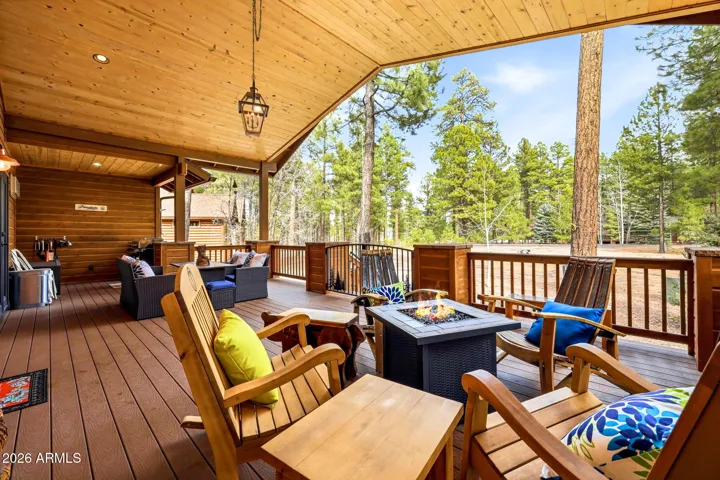 Relaxing covered porch looking out to cul de sac lot