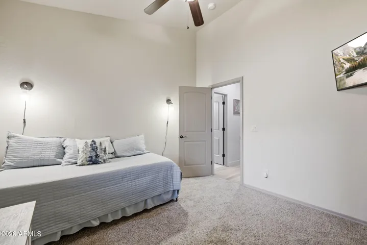 Vaulted ceilings with fan in guest room