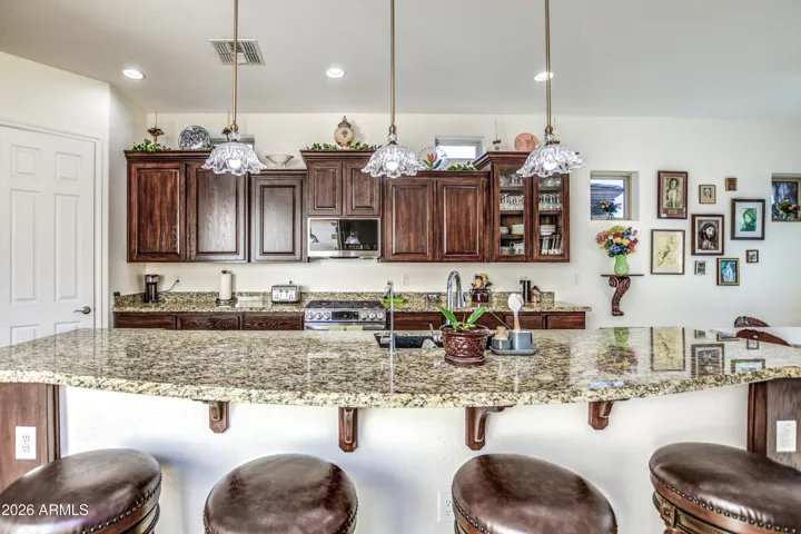 Lots of cabinets with corner pantry