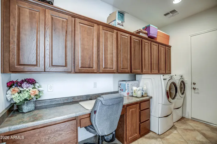 Lots of cabinets and access to the garage