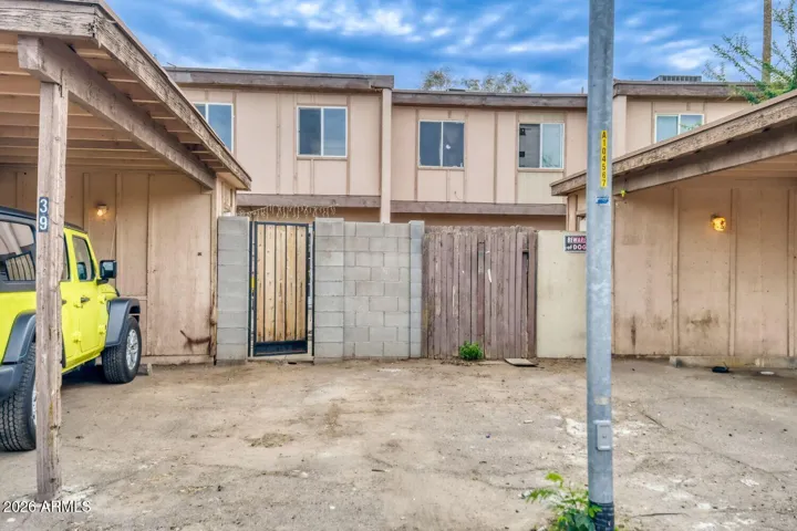 Direct access to two carport spaces with one covered and one uncovered spot.