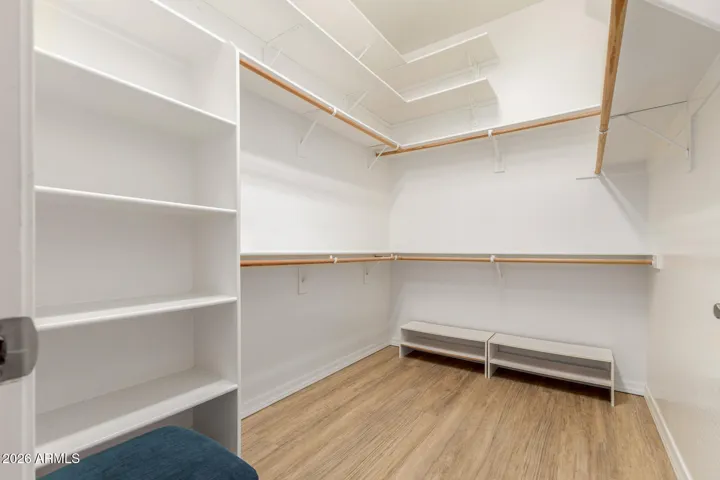Primary walk-in closet.
