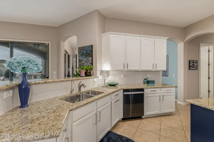 Breakfast bar between the kitchen and family room.
