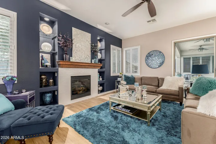 Family room off of the kitchen with gas fireplace.