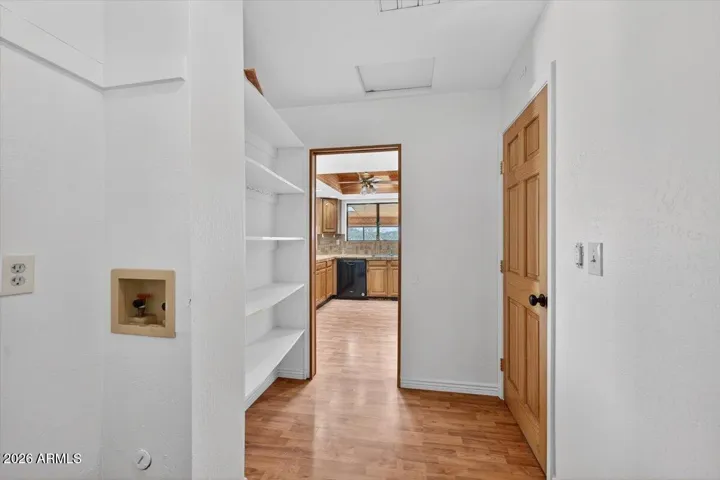 Laundry/pantry area opens to both homes.