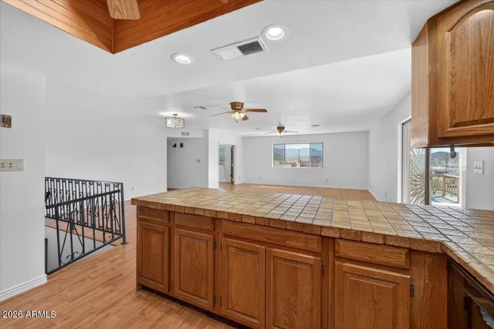 Looking from Kitchen to stairs to basement.