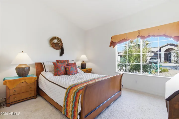 Comfortable guest bedroom with walk-in closet.