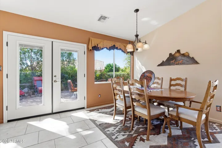 Light-filled dining area ideal for everyday meals or hosting guests.