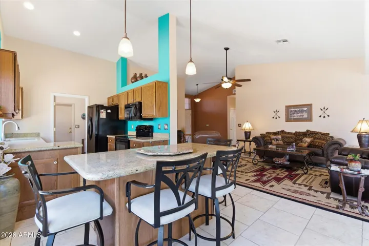 Expansive island providing additional prep space and seating.