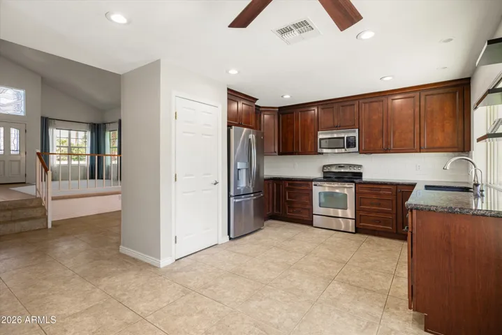The kitchen is the heart of the home with easy access to the living/dining and family room.