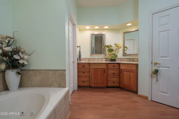 Large soaker tub in primary bathroom