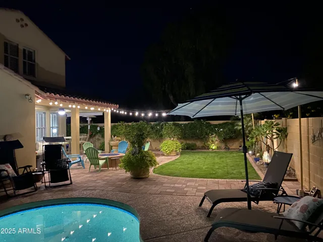 Backyard at Night looking south toward Covered Patio
