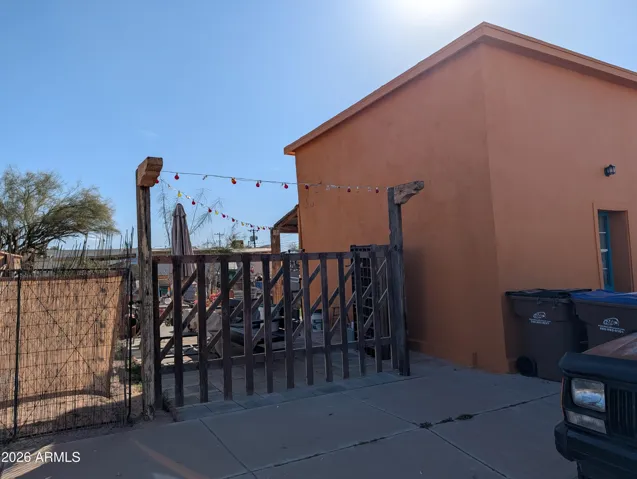 The north back yard with a decorative gate.