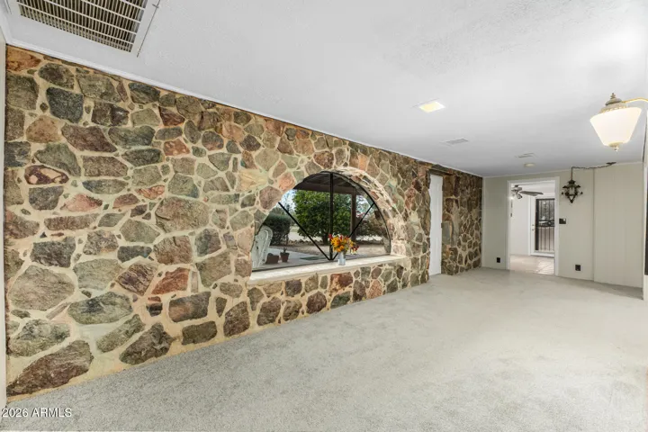 The beautiful rock wall in the front room