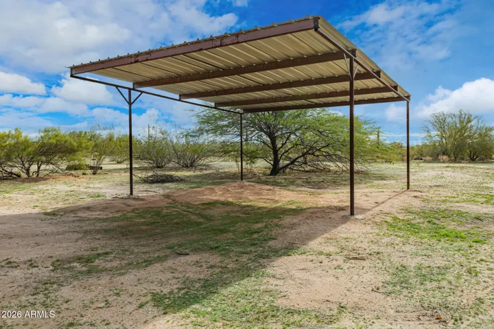 Shade structure for parking or hay storage.