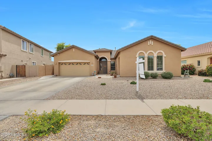 Welcoming single-level Glendale home featuring desert landscaping, a 2-car garage, and a spacious driveway. This inviting exterior highlights low-maintenance design and strong curb appeal in a prime location near major freeways and entertainment.