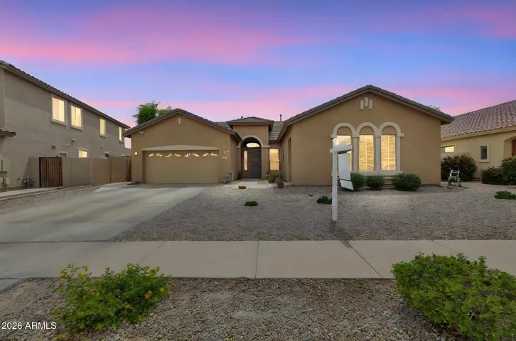 Beautiful evening view of this Glendale home with warm lighting and enhanced curb appeal. The twilight setting highlights the home’s welcoming design and peaceful neighborhood atmosphere.