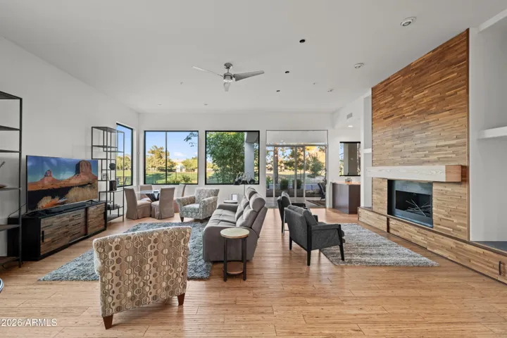 Open Scottsdale kitchen overlooking the family room, featuring modern updates and functional design. Ideal for entertaining with connected living spaces and natural light.
