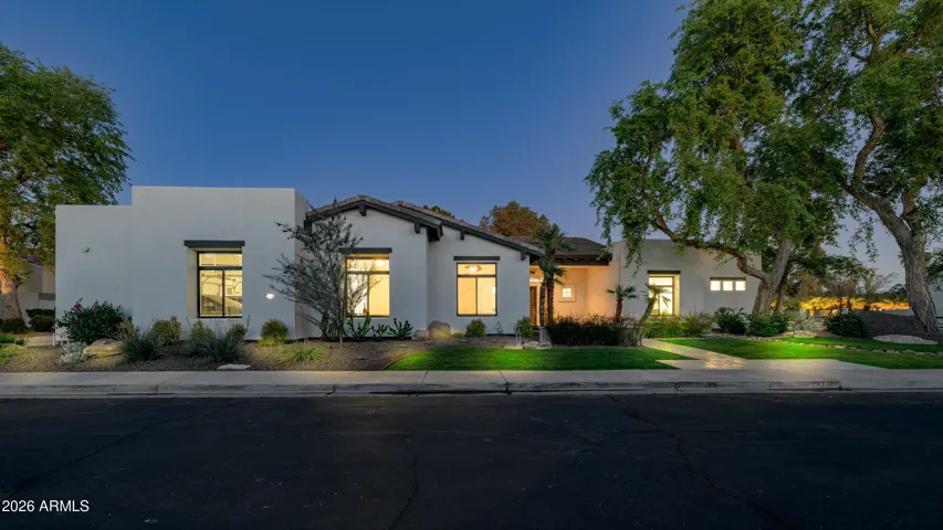 Gorgeous Scottsdale property surrounded by mature trees and professionally designed landscaping. Offers shade, privacy, and enhanced outdoor living appeal.