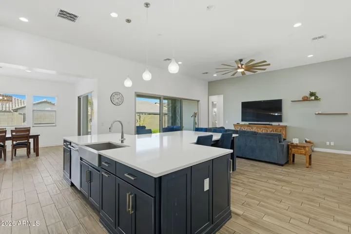 Accent Colored Island cabinets at the T-Shaped island