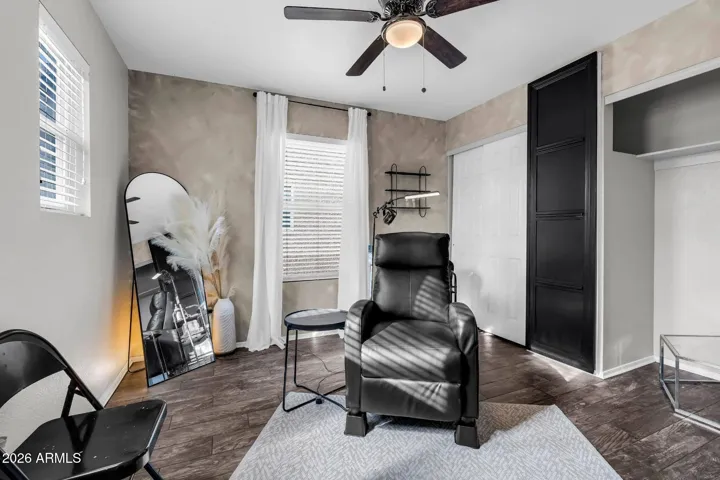 Bedroom 3 with a ceiling fan & light combo