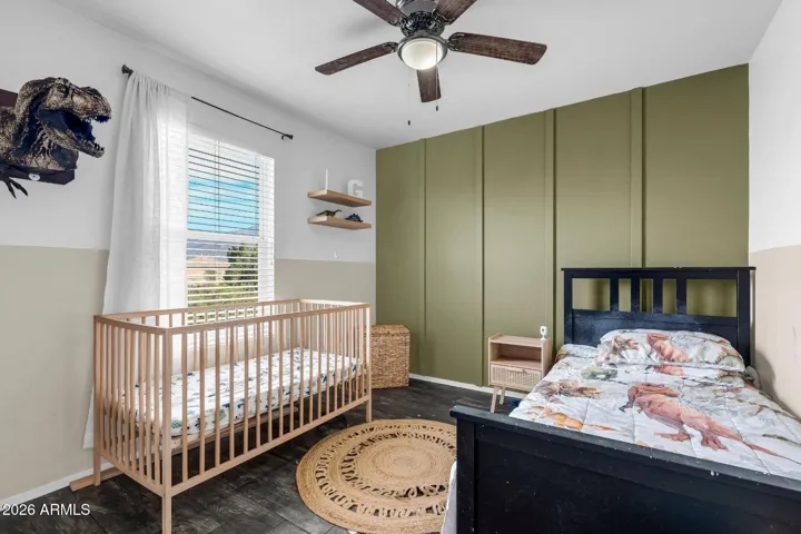 Bedroom 2 features a board and Batten accent wall