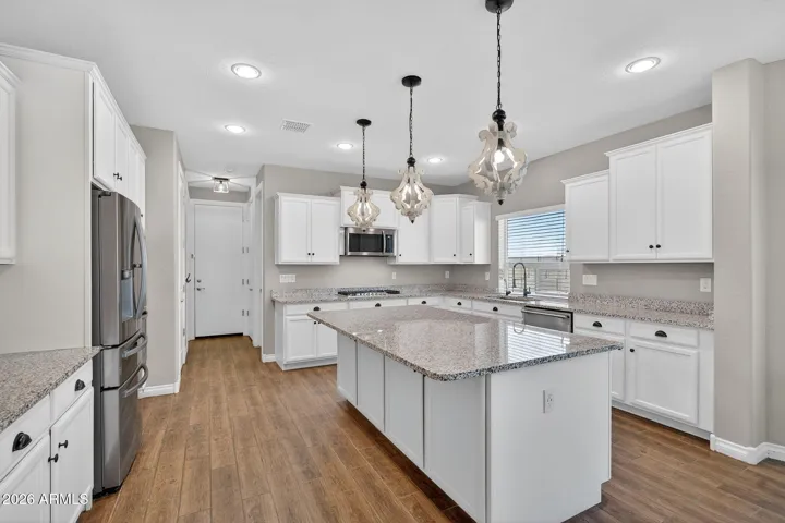Large island that functions (prep, seating, hosting)
